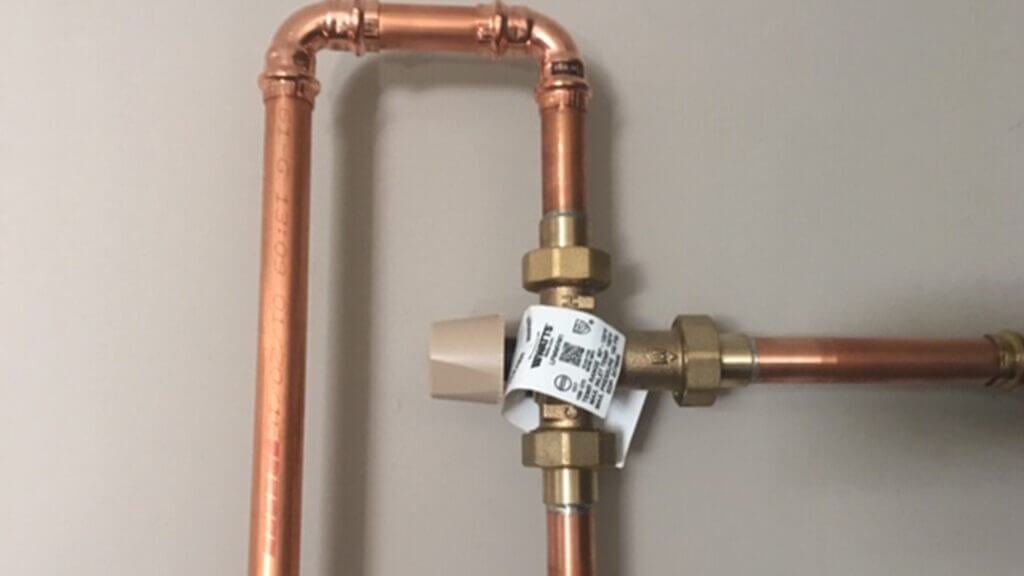 How a Mixing Valve Can Get More Out of Your Water Heater Water