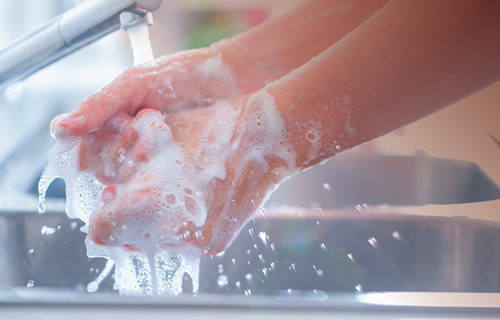 rinse hands with water